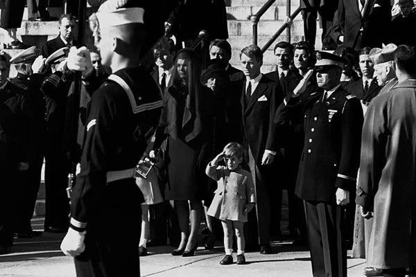 Large Black & White Art - Canvas Prints: John F. Kennedy Jr. salutes his father's coffin along with the honor guard, 1963 by Unknown Artist