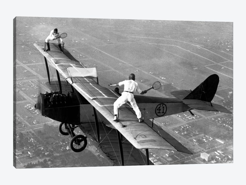 Playing Tennis on a Biplane in 1925 by Unknown Artist 1-piece Canvas Wall Art