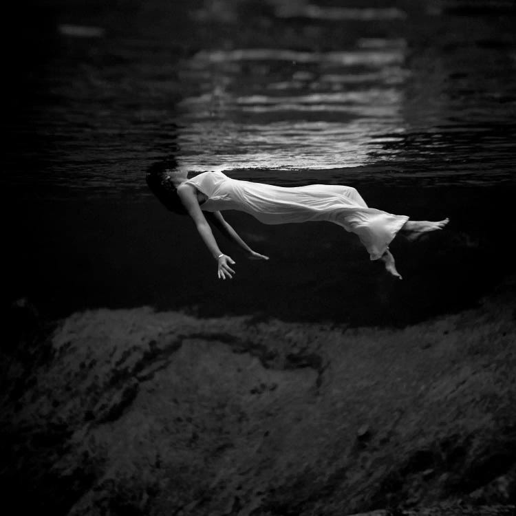 Woman In Water