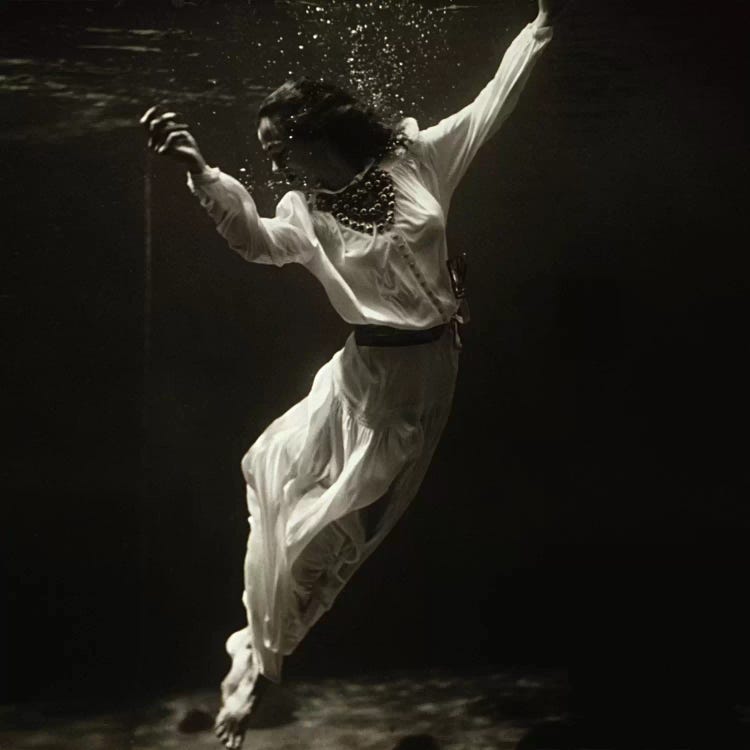 Fashion Model Underwater in Dolphin Tank (MarinelandFlorida) by Toni Frissell wall art