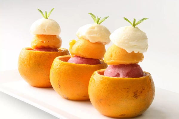 Foodie: Ice Cream Balls Inside Oranges by Unknown Artist