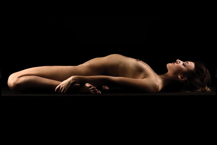 Nude Woman Sensual Laying Down On Black Background