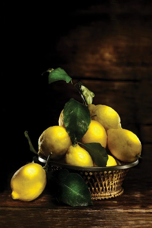 Yellow Lemon Into A Basket Over A Wooden Table