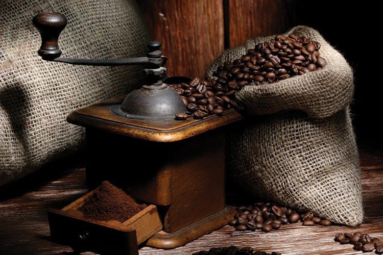 Coffe Grinder With Beans On A Wood Wooden Table