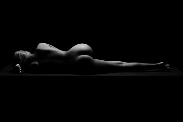 Nude Sexy Woman Sleeping And Resting Naked On Black Background