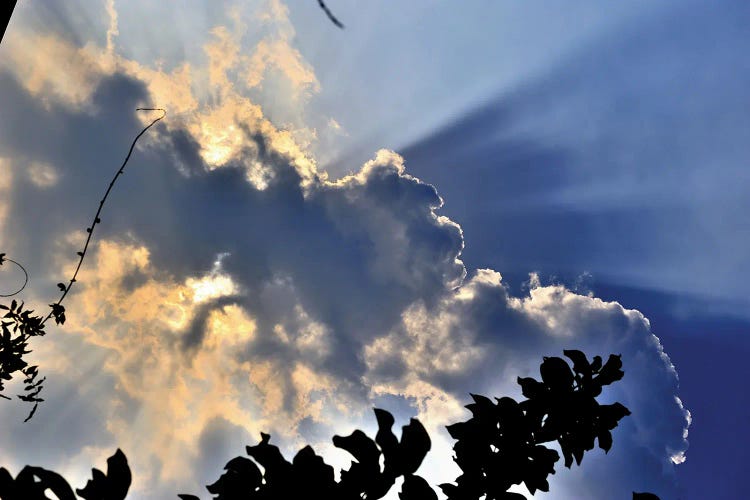 Sun Hidden By Clouds On A Blue Sky, In A Sunny Day In Milan, Italy