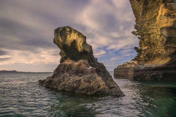Ecuador: Rock Formation Off Bartholomew Island, Galapagos Islands, Ecuador. by Adam Jones