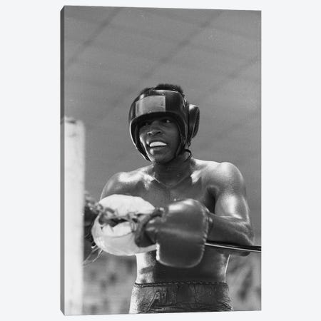 Head Gear Wearing Muhammad Ali In The Corner Between Rounds Canvas Print #ALI12} by Muhammad Ali Enterprises Canvas Art Print