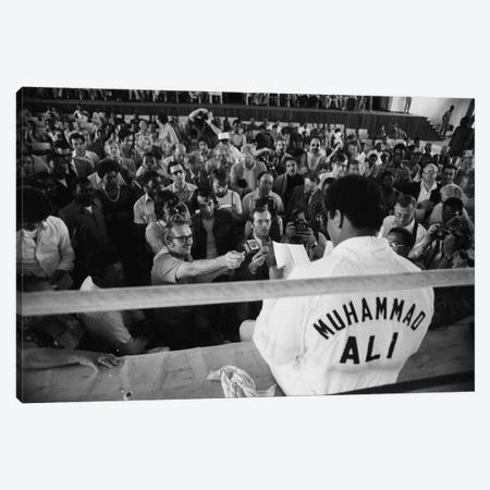 Muhammad Ali Sitting On The Side Of A Ring Talking To The Press Canvas Print #ALI51} by Muhammad Ali Enterprises Art Print