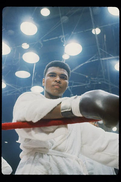 Muhammad Ali Enterprises - Unframed Prints: Pre-Fight Corner Shot Of A Young, Robed Muhammad Ali by Muhammad Ali Enterprises