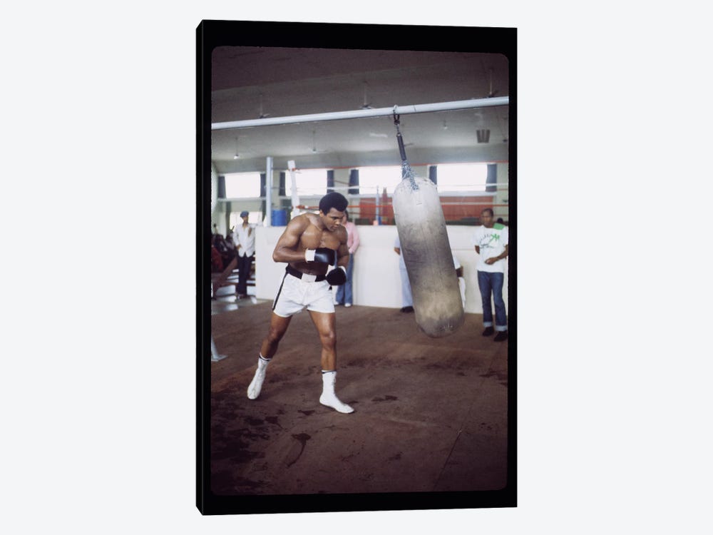 Punching Bag Work At Rumble In The Jungle™ Training Session by Muhammad Ali Enterprises 1-piece Art Print