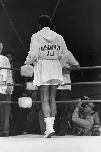 Rear View Of A Robed Muhammad Ali