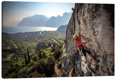 A Climber Above The Town Of Arco And Lago di Garda, Italy Canvas Art Print - Extreme Sports Art