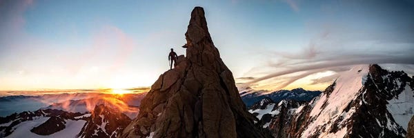 Alex Buisse: A Climber At Sunrise On Aiguille du Chardonnet, Chamonix, France by Alex Buisse