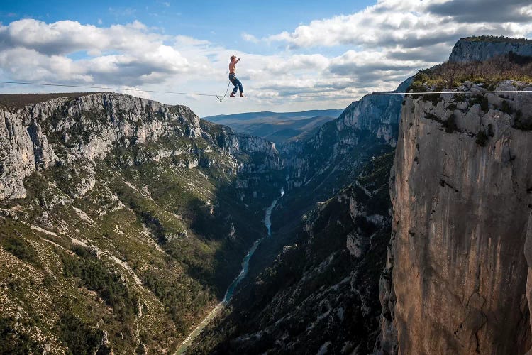 A Highliner In Verdon Gorges, Hundreds Of Meters Above The Ground, Paca, France