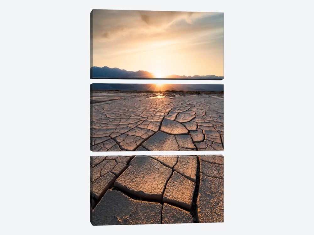 Sun Setting Beyond The Intricate Mud Cracks Of Death Valley by Alexander Sloutsky 3-piece Canvas Wall Art