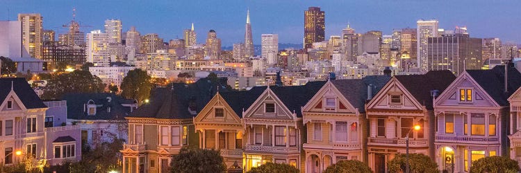 San Francisco, California, Victorian homes and city at dusk