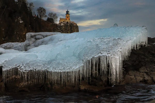 Minnesota: The Lighthouse And The Ice Cascade by Brian Bielke