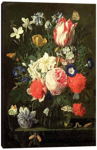 Rose, tulip, morning glory and other flowers in a glass vase on a stone ledge Canvas Art Print