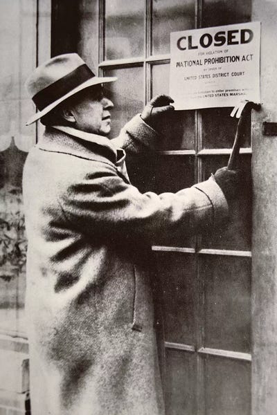 Signs: A US Federal Agent Closing A Saloon During Prohibition by American Photographer