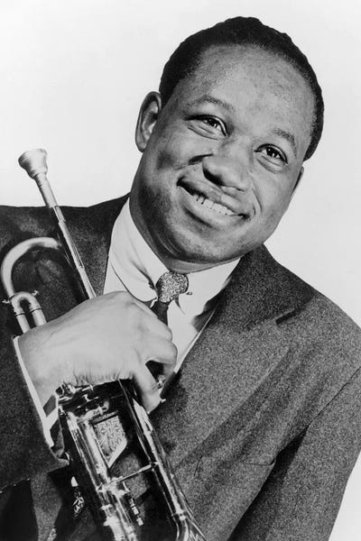 Trumpets: Clifford Brown  jazz trumpet player in 1953 by Rue Des Archives