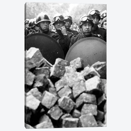 Members of the French riot police with helmet and shiled behing pile of cobblestones during demonstration in Paris on may 1968 Canvas Print #BMN8614} by Rue Des Archives Canvas Art