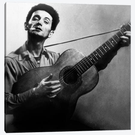 Musician Woody Guthrie  considered as the father of folk music c. 1940 Canvas Print #BMN8618} by Rue Des Archives Canvas Art Print
