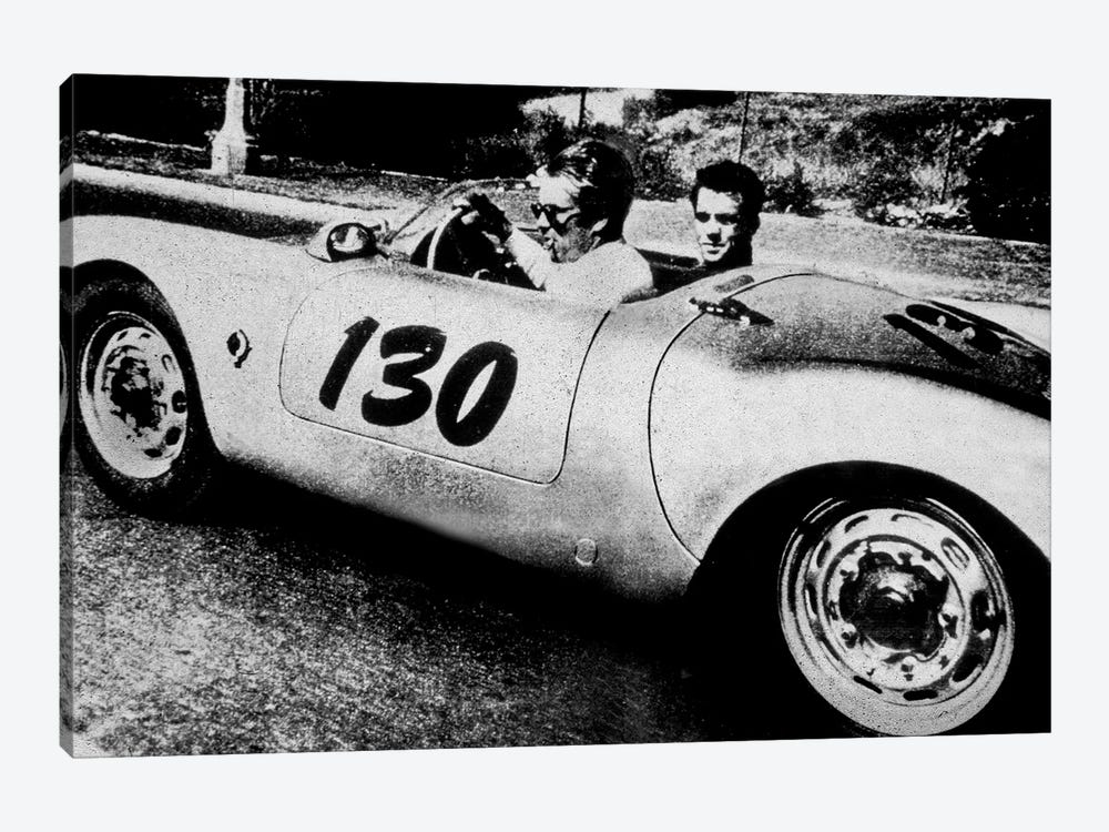 The American Actor James Dean driving his Porsche Spider 550A with Rolf Wutherlich , in 1955 by Rue Des Archives 1-piece Canvas Print