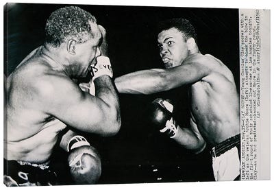 Young Cassius Clay against Archie Moore in the first round. Los Angeles, 15th November 1962  Canvas Art Print