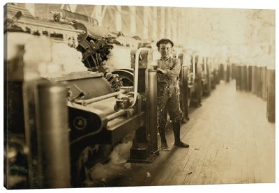 Boy sweeper by carding machines at Lincoln Cotton Mills, Evansville, Indiana in stockinged feet on a slippery floor, 1908  Canvas Art Print