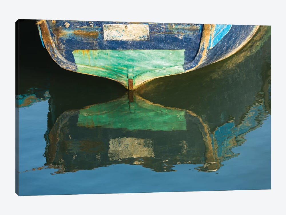 Morocco, Essaouira. An artistic watercolor effect of a wooden boat floating in the harbor. by Brenda Tharp 1-piece Canvas Print