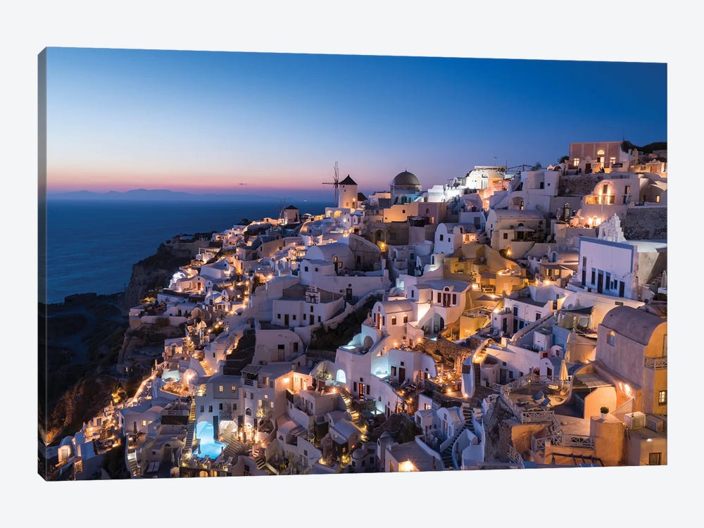 Greece, Santorini. The Village Of Oia Glows In The Post-Sunset Light As The Town'S Lights Add Magic To This Iconic Scene. by Brenda Tharp 1-piece Canvas Print