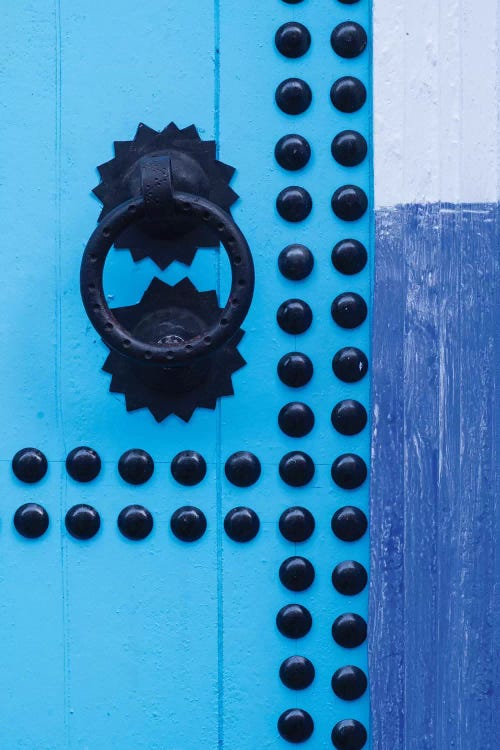 Morocco, Chefchaouen. Detail of blue door and doorknocker