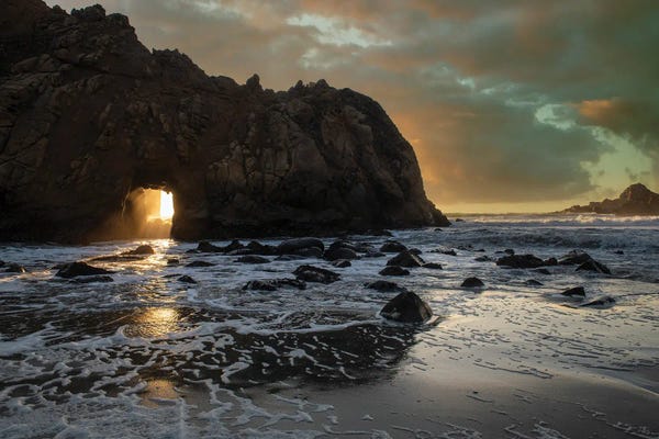 Big Sur: Sunset Shines Through A Tunnel In This Sea Rock At Big Sur by Betty Sederquist