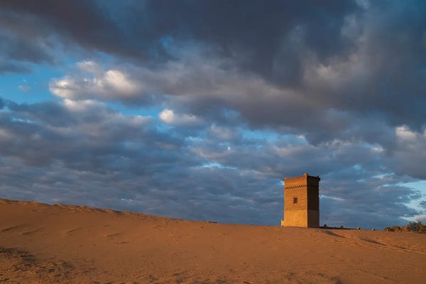 Betty Sederquist: Water Tower Glows Orange In Sunrise Light by Betty Sederquist
