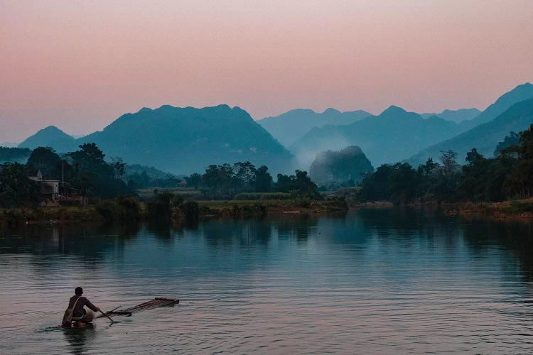 Asia, Vietnam, Pu Luong Nature Reserve. Lone Man Takes Simple Raft Out Onto River For Sunset Cruise.