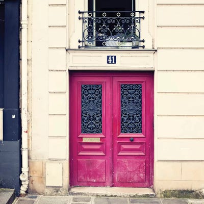 Paris Pink Door by Caroline Mint framed canvas print