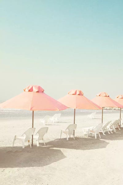 Pastel Umbrellas In The Beach by Caroline Mint framed canvas print