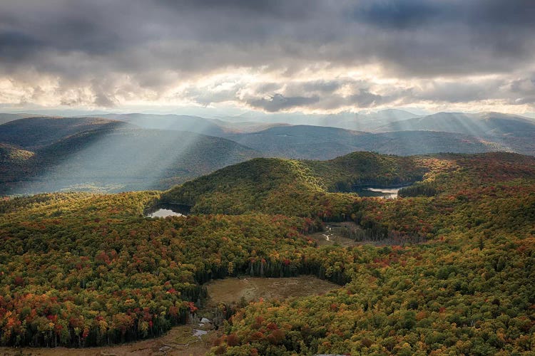 USA, New York State. Autumn sunrays in the mountains, Adirondack Mountains.