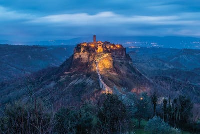 Lights In The Darkness (Civita Di Bagnoregio, Italy) by Chano Sánchez framed canvas print