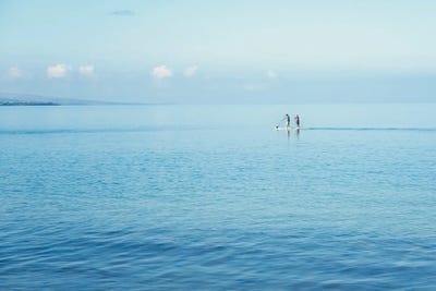 Surfboard Paddling by Dennis Frates canvas print