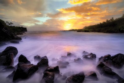 Black Sand Beach Sunrise by Dennis Frates canvas print