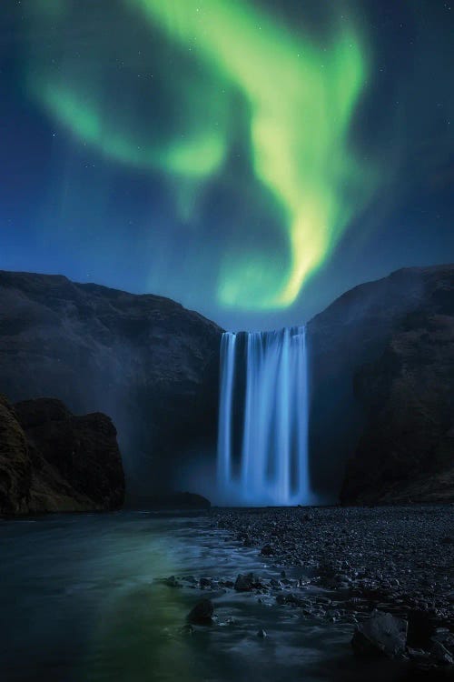 Dancing Aurora Borealis Above Skogafoss