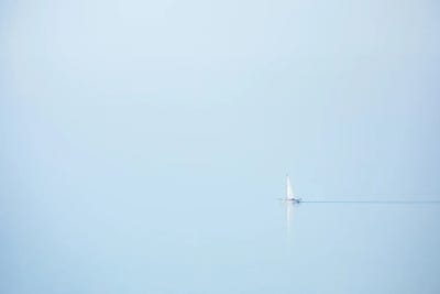 A Sailboat At The Foggy Coast Of Brittany by Daniel Gastager canvas print