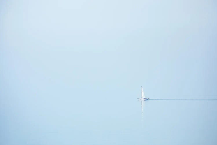 A Sailboat At The Foggy Coast Of Brittany