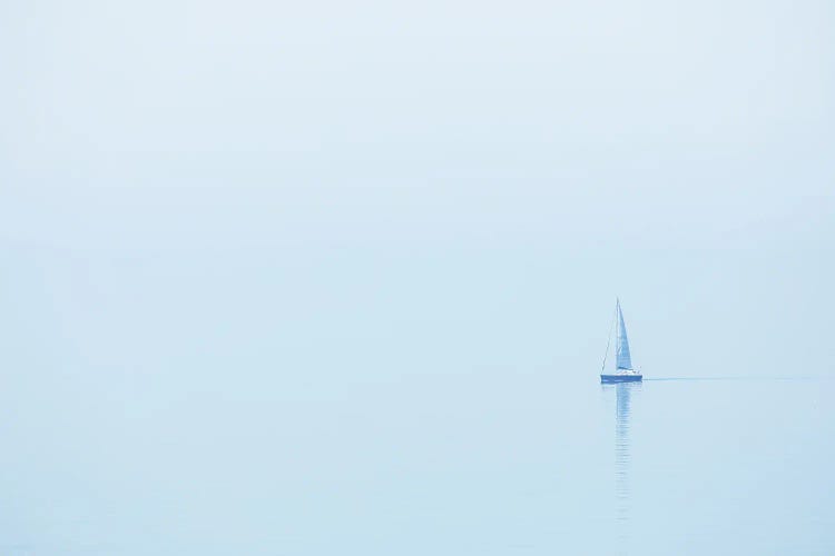 A Sailboat At The Foggy Coast In France