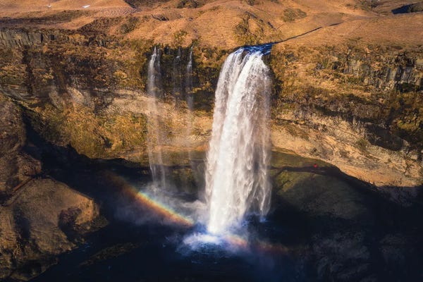 Hella: A Rainbow At Seljalandsfoss by Daniel Gastager