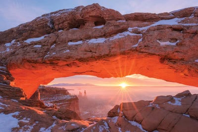 A Winter Sunrise At Mesa Arch by Daniel Gastager framed canvas print