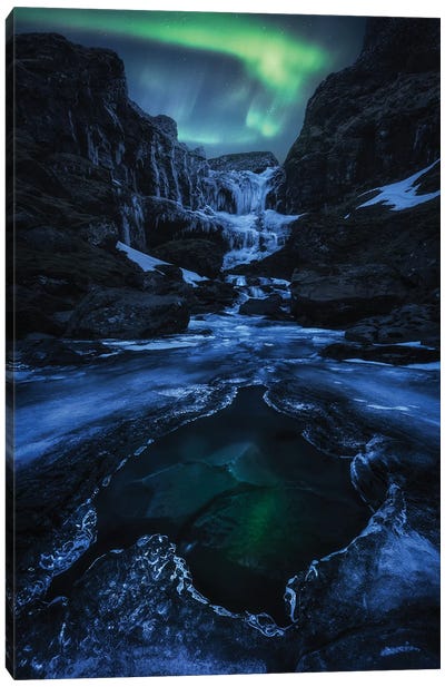 Northern Light Dancing Above A Frozen Waterfall In Iceland Canvas Art Print - Daniel Gastager