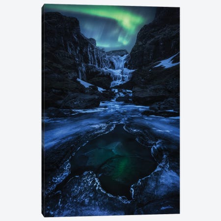 Northern Light Dancing Above A Frozen Waterfall In Iceland Canvas Print #DGG60} by Daniel Gastager Canvas Art Print